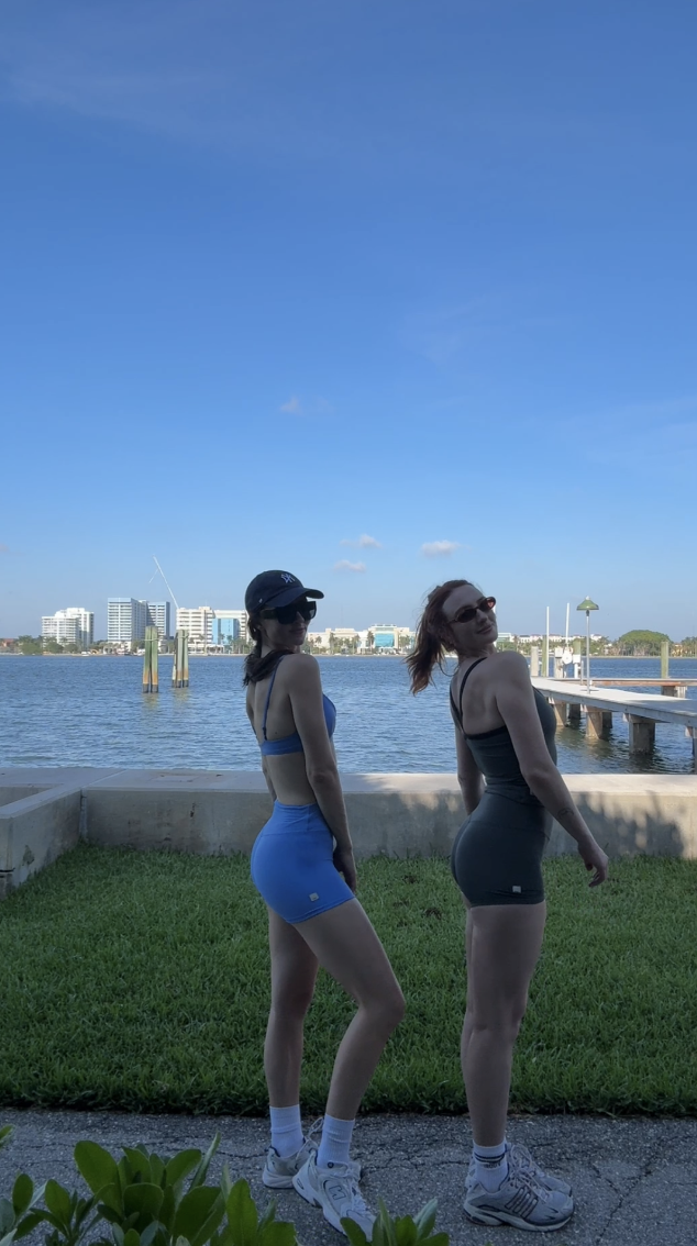 Lara and Skylar Dykstra walking together by the waterfront