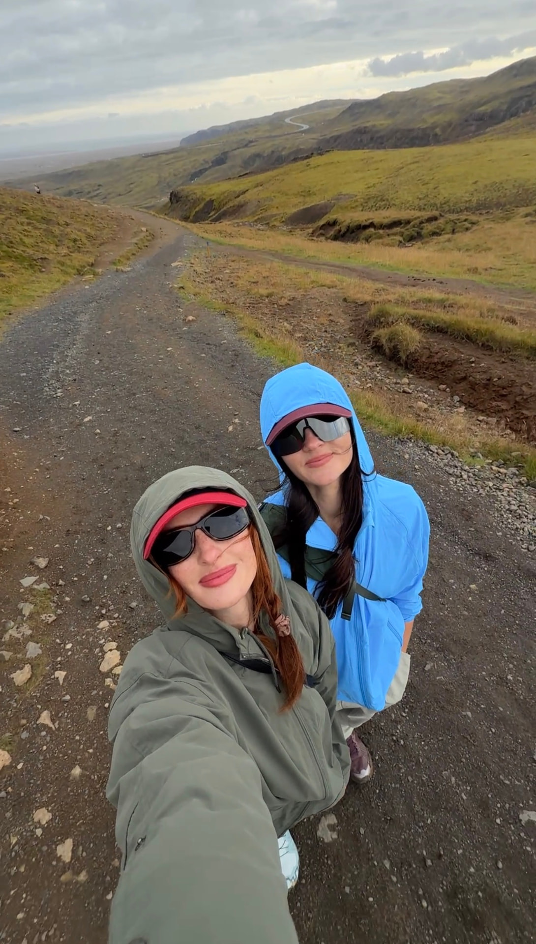 Lara and Skylar Dykstra taking a selfie on a mountain trail
