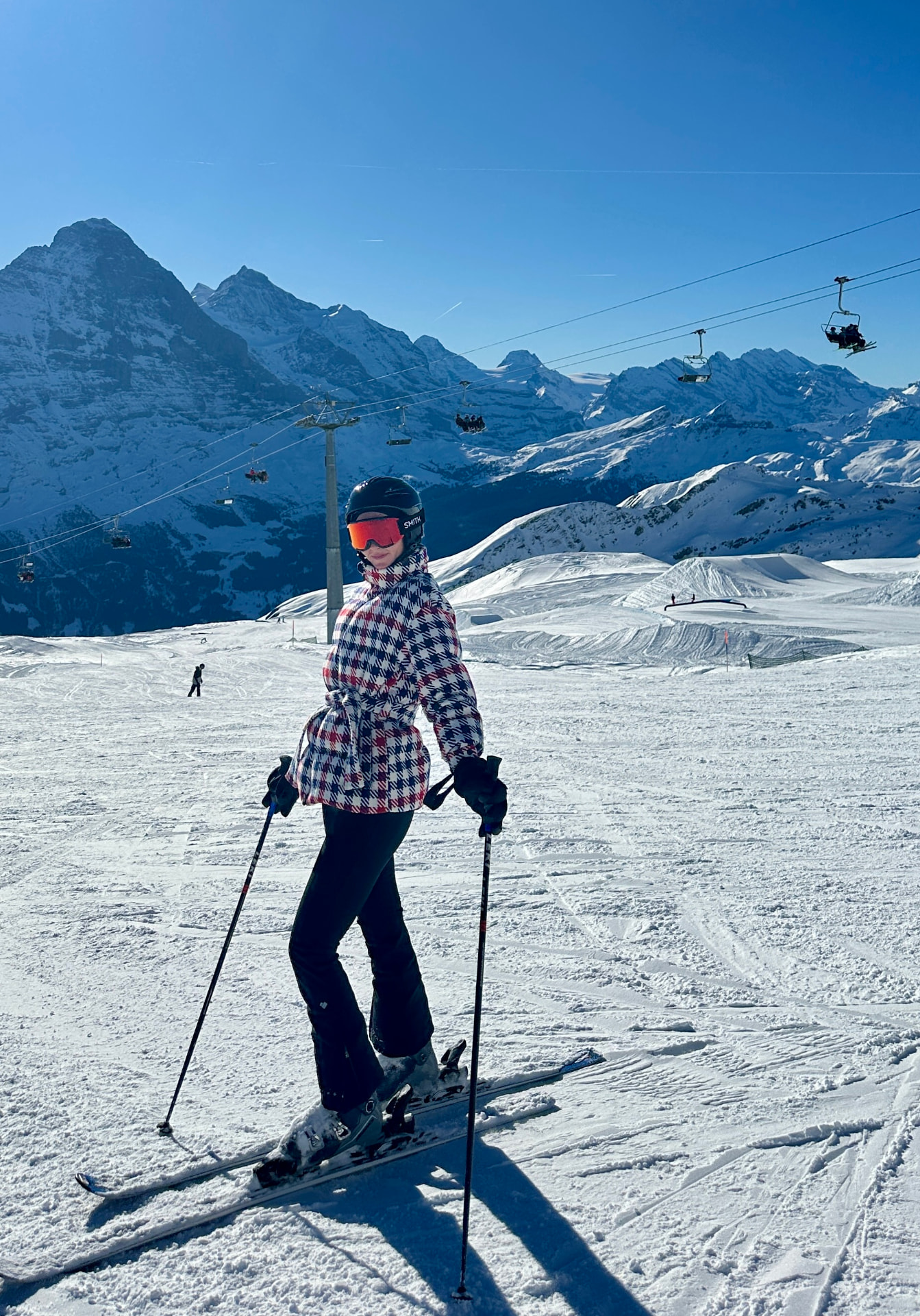 Skylar Dykstra skiing in the mountains